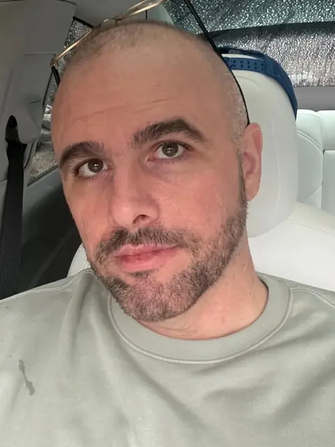 Christopher Maddaloni, founder of Advernation, in a light grey sweatshirt