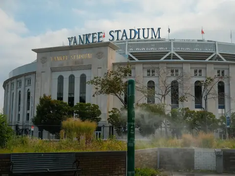 The stone front of Yankee Stadium in the Bronx with its name in large letters